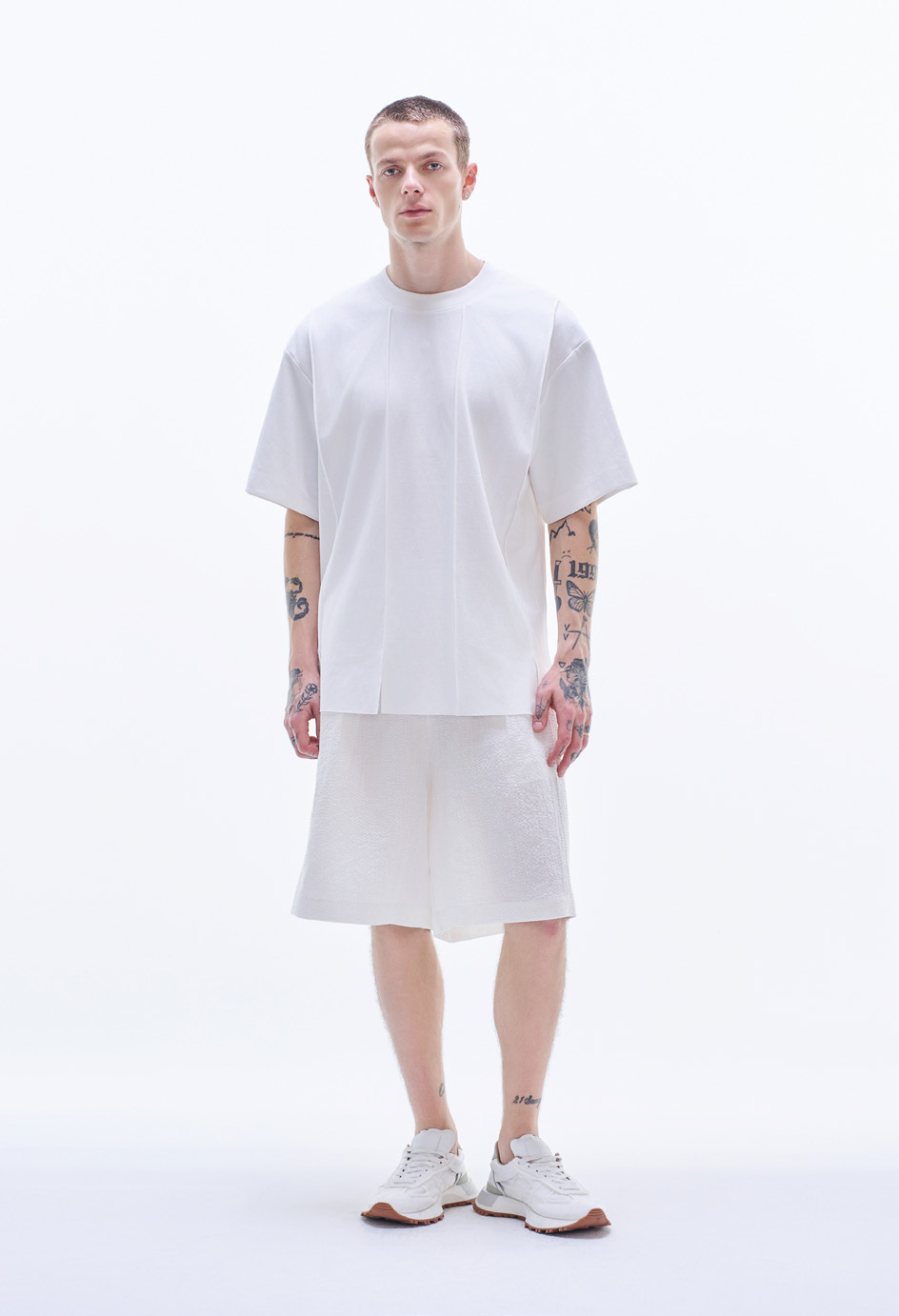 Tee With Strip Cut And Slits
