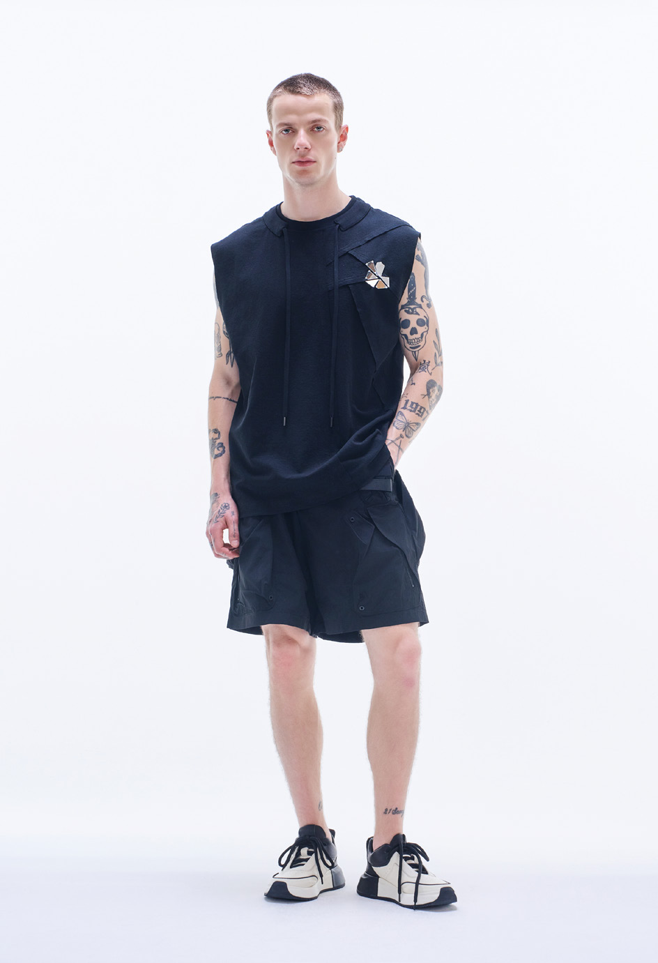 Knit Vest With Raw Edge Cut & Mirrors